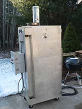 The snow is on the ground, but this insulated smokehouse can maintain high temperatures in any conditions.