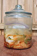 stuffed cabbages in glass jar