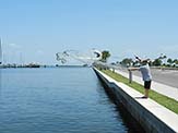 Casting from a deck. The old St.Petersburg pier in the background.