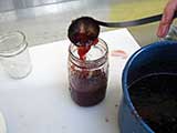 strawberries filling ladle