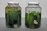 Well packed cucumbers in jar on the right