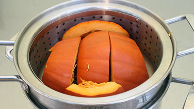 pumpkin in a steamer pot