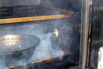 Smoke entering smokehouse