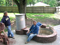 Laying firebricks inside fire pit